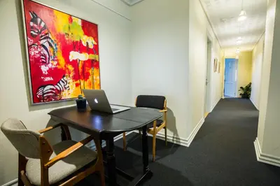 an office with a table with a laptop on it at Bed & Breakfast Holstebro in Holstebro