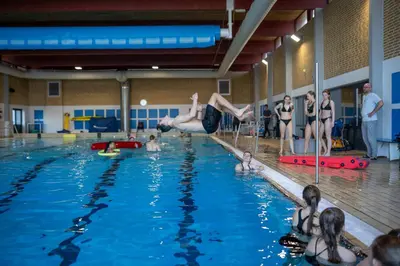 a group of people in a swimming pool at Idrætscenter Jammerbugt in Fjerritslev
