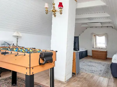 a room with a foosball table in a room at 6 person holiday home in Harboøre-By Traum in Harboør