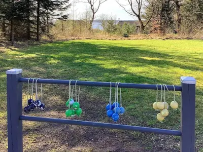 a blue pole with a bunch of hanging balloons at Spacious Family Retreat - By Traum Ferienwohnungen in Skals