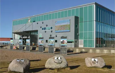 a building with two large rocks in front of it at Three-Bedroom Holiday Home In Lemvig in Lemvig