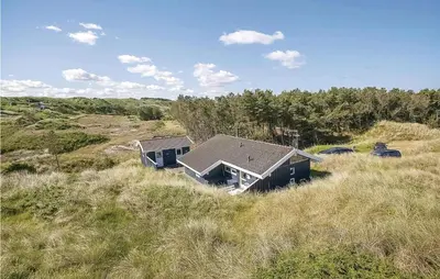 an aerial view of a house in a field at Beautiful Home In Blokhus With Wifi in Blokhus