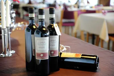 two bottles of wine sitting on a table at Danhostel Nykøbing Mors in Nykøbing Mors