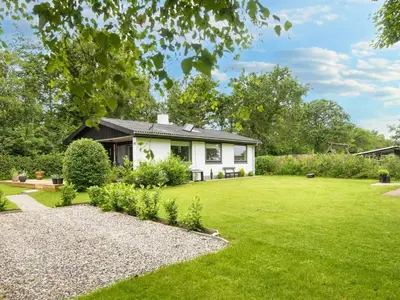 a house with a garden and a lawn at 5 person holiday home in Vinderup-By Traum in Vinderup