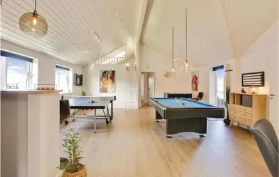 a large room with two pool tables in it at 8 Bedroom Awesome Home In Thisted in Thisted