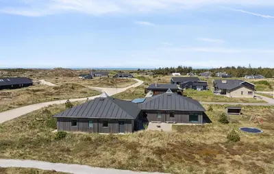 an aerial view of a house in a field at Nice Home In Thisted With Sauna in Thisted