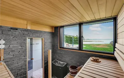 a room with a view of the ocean and a window at Amazing Home In Løgstrup With Wifi in Løgstrup