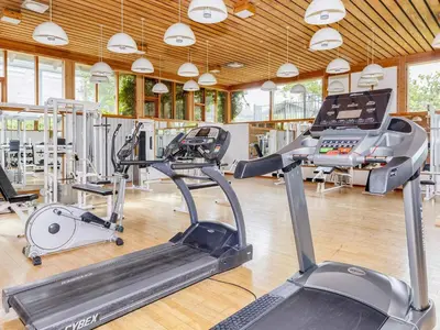 a gym with several treadmills and a treadmill at Type2 holiday home in Hanstholm in Hanstholm