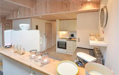 a kitchen with a counter with glasses on it at Amazing Home In Thisted With Kitchen in Thisted