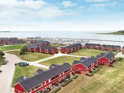 an aerial view of a building near the water at 5 person holiday home on a holiday park in Lemvig in Lemvig