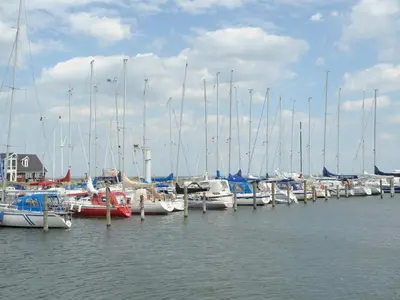 a bunch of boats are docked in the water at 5 person holiday home on a holiday park in Lemvig in Lemvig