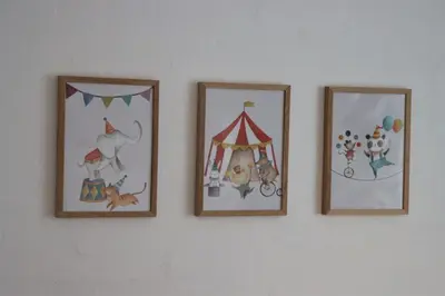 three framed pictures of a circus tent on a wall at Roslev Hus in Roslev