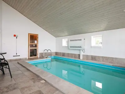 a swimming pool in a house at 8 person holiday home in Skals in Skals