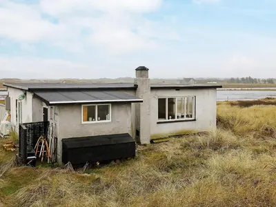 a house in the middle of a field at 4 person holiday home in Fjerritslev in Fjerritslev