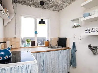 a small kitchen with a sink and a window at 4 person holiday home in Fjerritslev in Fjerritslev
