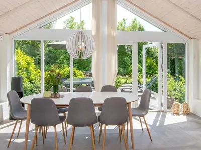 a dining room with a table and chairs at 6 person holiday home in Højslev-By Traum in Højslev