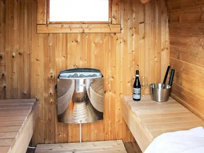 a room with a hammock in a wooden cabin at 10 person holiday home in Vinderup-By Traum in Vinderup