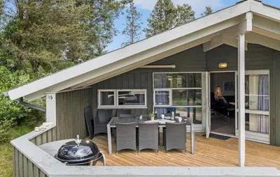 a house with a deck with a gazebo at Holiday Home Østersvej Fjerritslev Xii in Fjerritslev