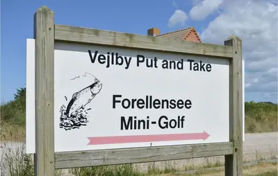 a sign for a vegetable put and take for fertilisers at Holiday Home Themisvej Harboøre Xii in Harboør