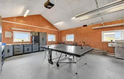 a large kitchen with a ping pong table in it at Amazing Home In Thisted With Sauna in Thisted