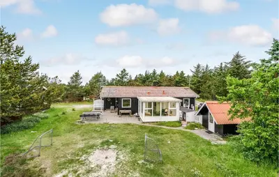 a house in the middle of a field at Holiday Home Mølgårdsvej Thisted in Thisted