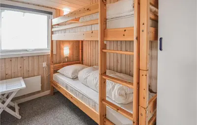 a bedroom with bunk beds in a cabin at Lovely Home In Thisted With Wifi in Thisted