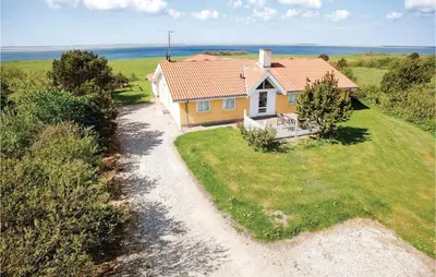 an overhead view of a house with a gravel road at Beautiful Home In Vestervig With Sauna in Vestervig