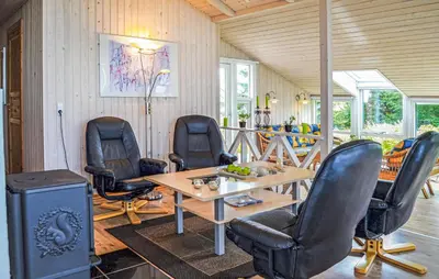 a dining room with chairs and a table at Three-Bedroom Holiday Home In Thisted in Thisted
