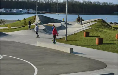 a group of people skateboarding at a skate park at Holiday Home Astersvej in Lemvig