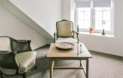 a room with a chair and a bowl on a table at Holiday Home Bakkegårdsvej in Vesløs
