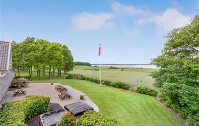 an overhead view of a park with benches and a flag at Rishøj in Løgstrup