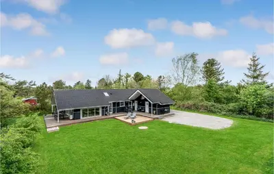 an aerial view of a house with a large yard at Holiday Home Marthasvej in Løgstør