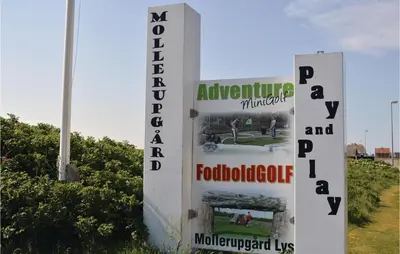 a sign for a museum and a football field at Holiday Home Viktoriavej Harboøre Ii in Harboør
