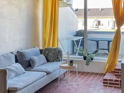 a living room with a couch and a table at 6 person holiday home in Brovst-By Traum in Brovst