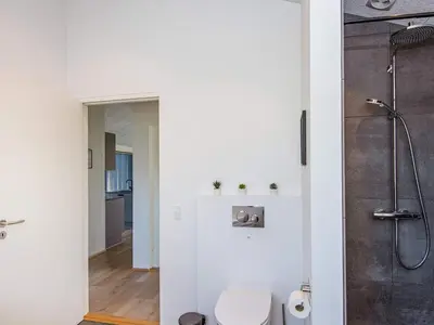a bathroom with a shower and a toilet in it at 6 person holiday home in Lemvig-By Traum in Lemvig