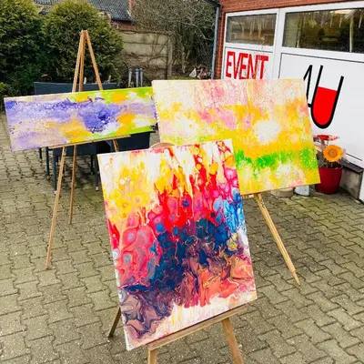 a group of paintings on easels on a street at Kørestolsvenligt dbl. vær. in Nykøbing Mors