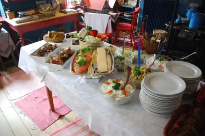 a table with a buffet of food on it at Skærum Mølle in Vemb