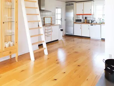 a kitchen with a wooden floor and a ladder at 8 person holiday home in Vesløs-By Traum in Vesløs