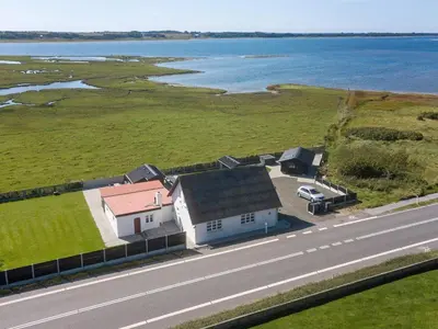 an aerial view of a house next to a road at 10 person holiday home in Roslev-By Traum in Roslev