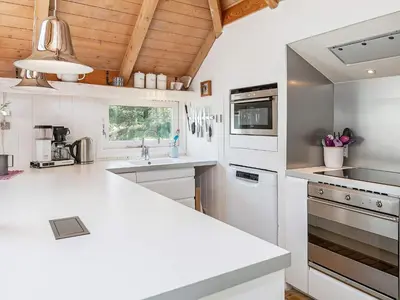 a kitchen with white counters and a white counter top at 10 person holiday home in Fjerritslev-By Traum in Fjerritslev