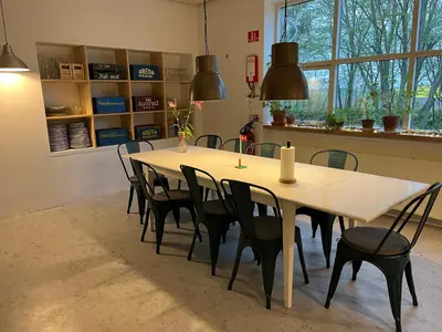 a dining room with a table and chairs at Room 3 - Hawkraft kulturhotel in Vestervig