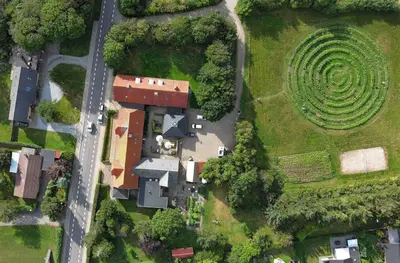 an aerial view of a house with a spiral garden at Room 17 - Hawkraft kulturhotel in Vestervig