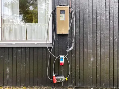 a gas meter attached to the side of a building at 4 person holiday home in Thisted-By Traum in Thisted