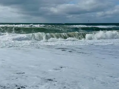 a group of waves in the ocean on a cloudy day at 6 person holiday home in Vestervig-By Traum in Vestervig