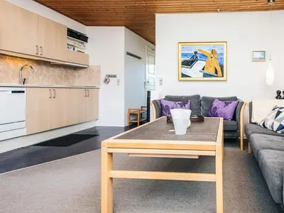 a living room with a couch and a table at 6 person holiday home in Vestervig-By Traum in Vestervig