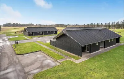 an overhead view of two buildings in a field at 2 Bedroom Nice Home In Pandrup in Pandrup