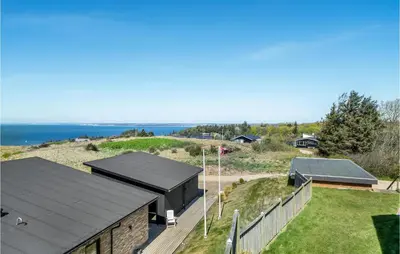an aerial view of a house with a roof at Stunning Home In Struer With Wifi in Struer