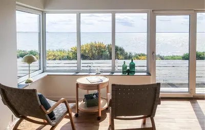 a living room with a view of the ocean at Lovely Home In Spøttrup With Wifi in Spottrup
