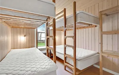 a bunk bed room with two bunk beds in it at Stunning Home In Hanstholm With Wifi in Hanstholm