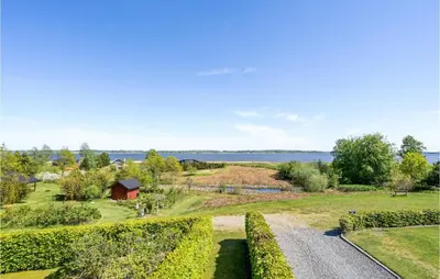 an aerial view of a garden with a road at 3 Bedroom Cozy Home In Højslev in Højslev